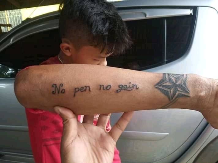 misspelled tattoo