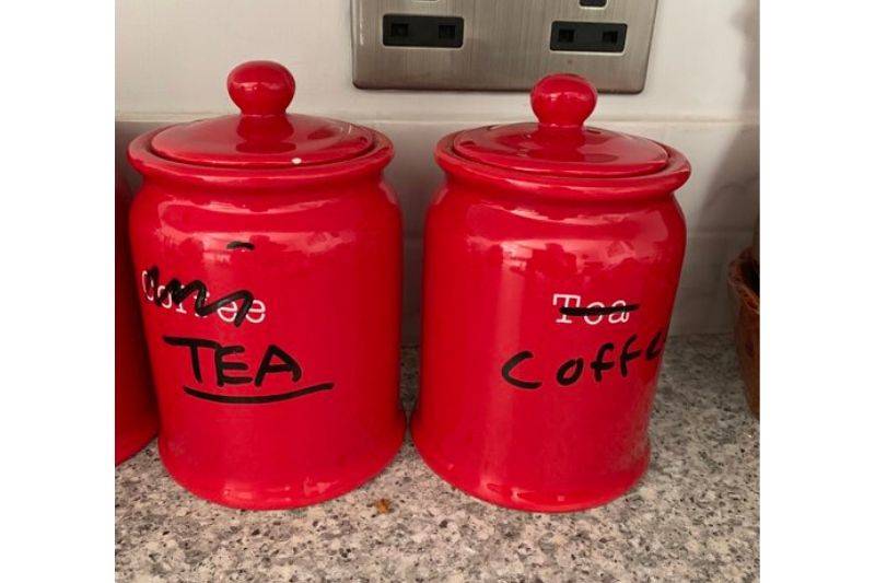 coffee and tea jars scribbled out