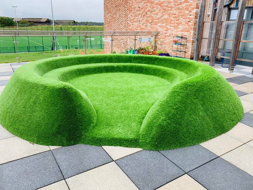 fake grass looks photoshopped