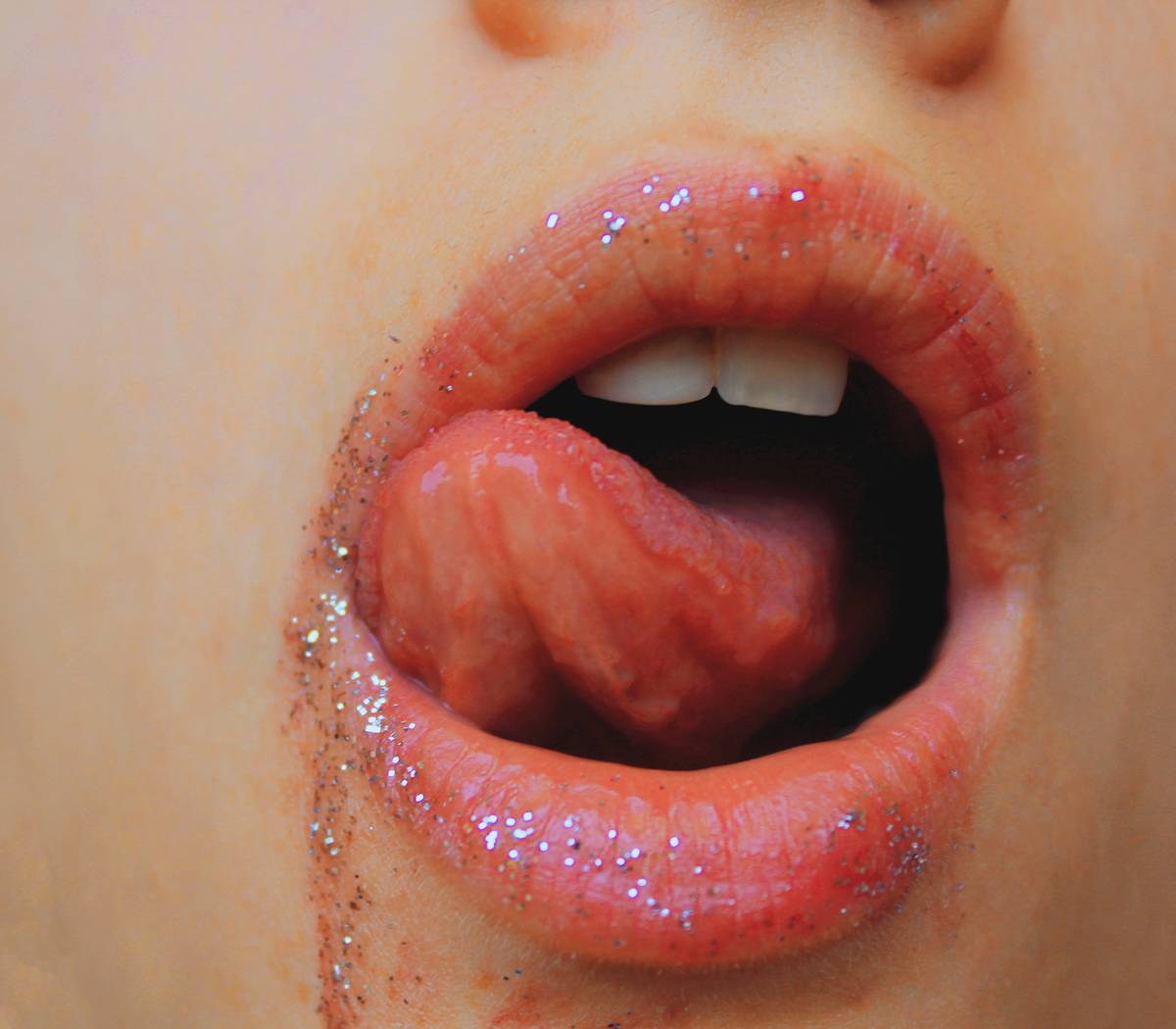 woman wearing Pink glittered lip tint