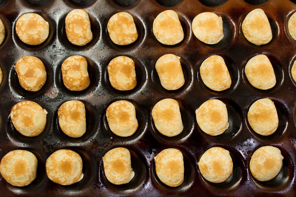poffertjes inside a baking pan