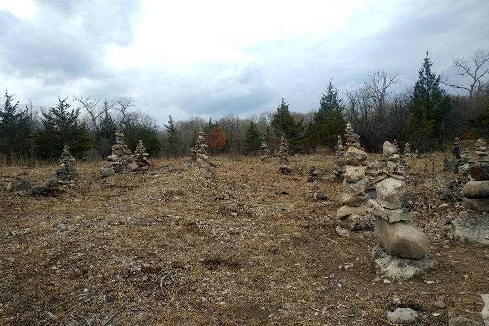 rocks piled up in a clearing 