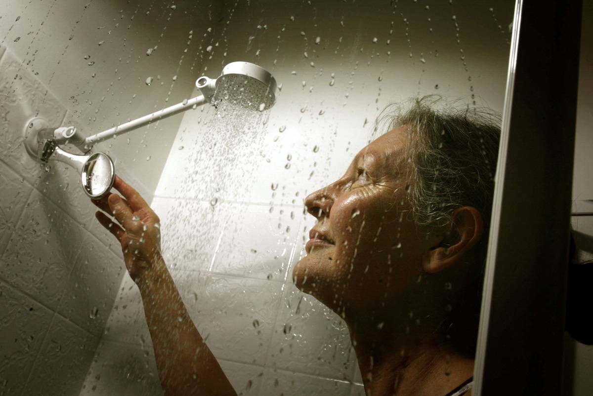 woman under shower head