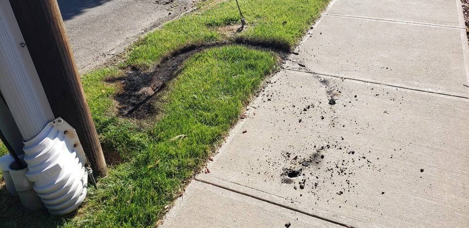 lightning struck the sidewalk
