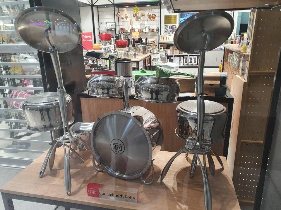 a drumset made out of pots and pans