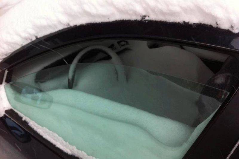 snow in the car from window down