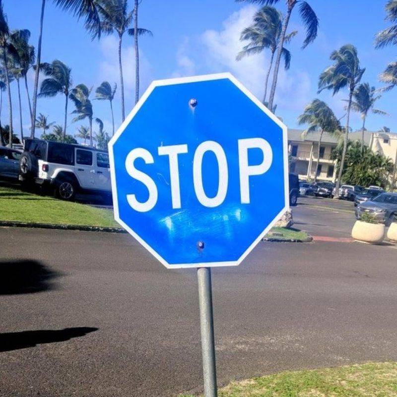 a blue stop sign