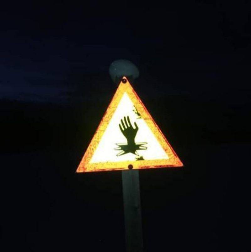 a beware of falling into the ice sign