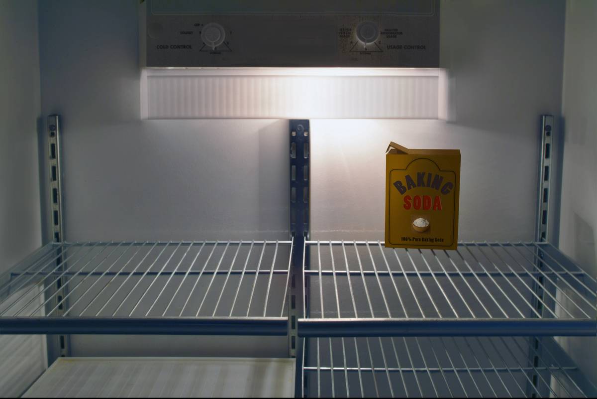 box of 'baking soda' in an otherwise empty refridgerator
