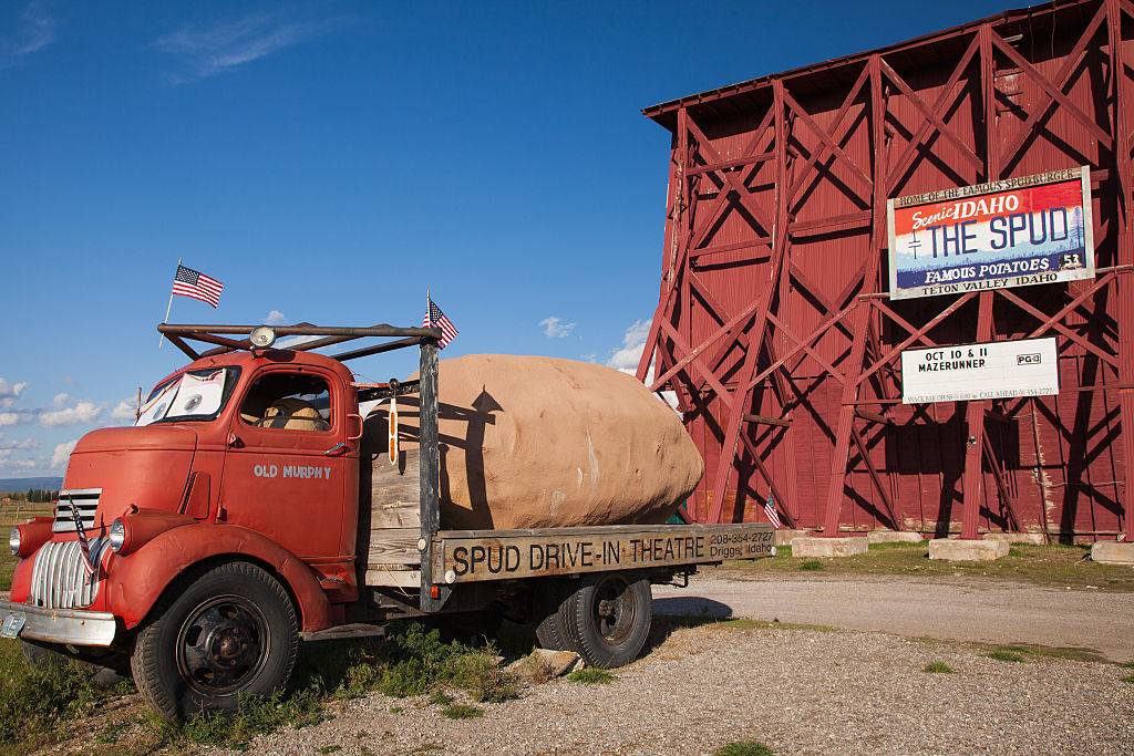 a drive-in with a truck carrying a large potato in Driggs, Idaho