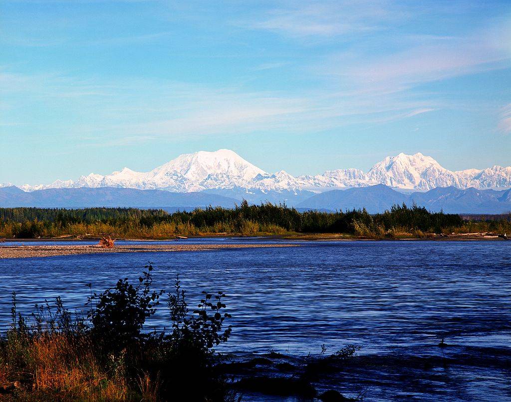 the susitna river and snow-capped mountains in Talkeetna, Alaska