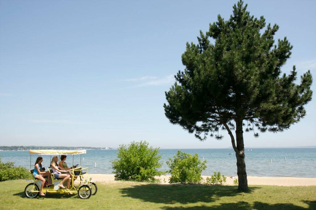 girls riding a quadracycle in Traverse City, Michigan