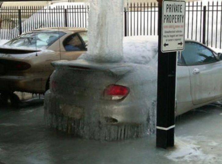 car completely frozen over