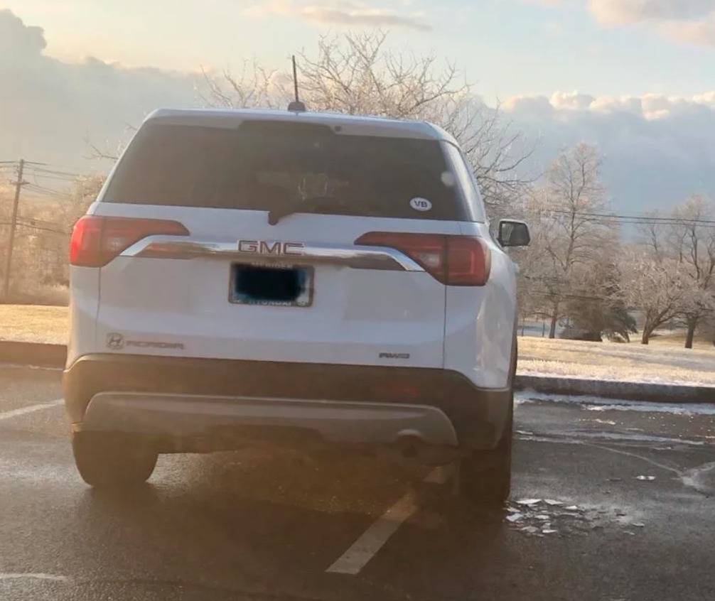 car parked over the lines horribly