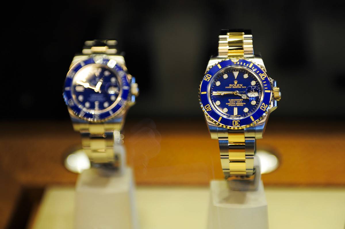 New Rolex watches are on display.