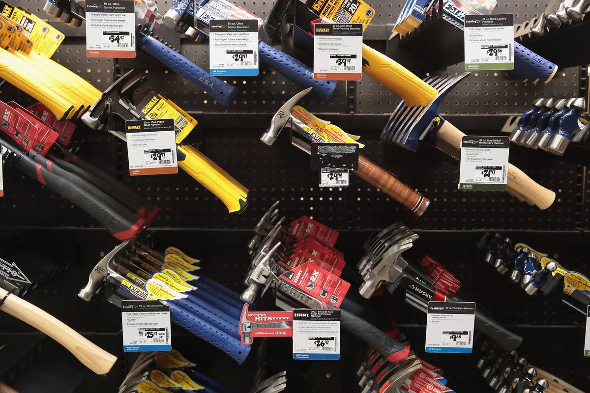 Tools hang in a Home Depot.