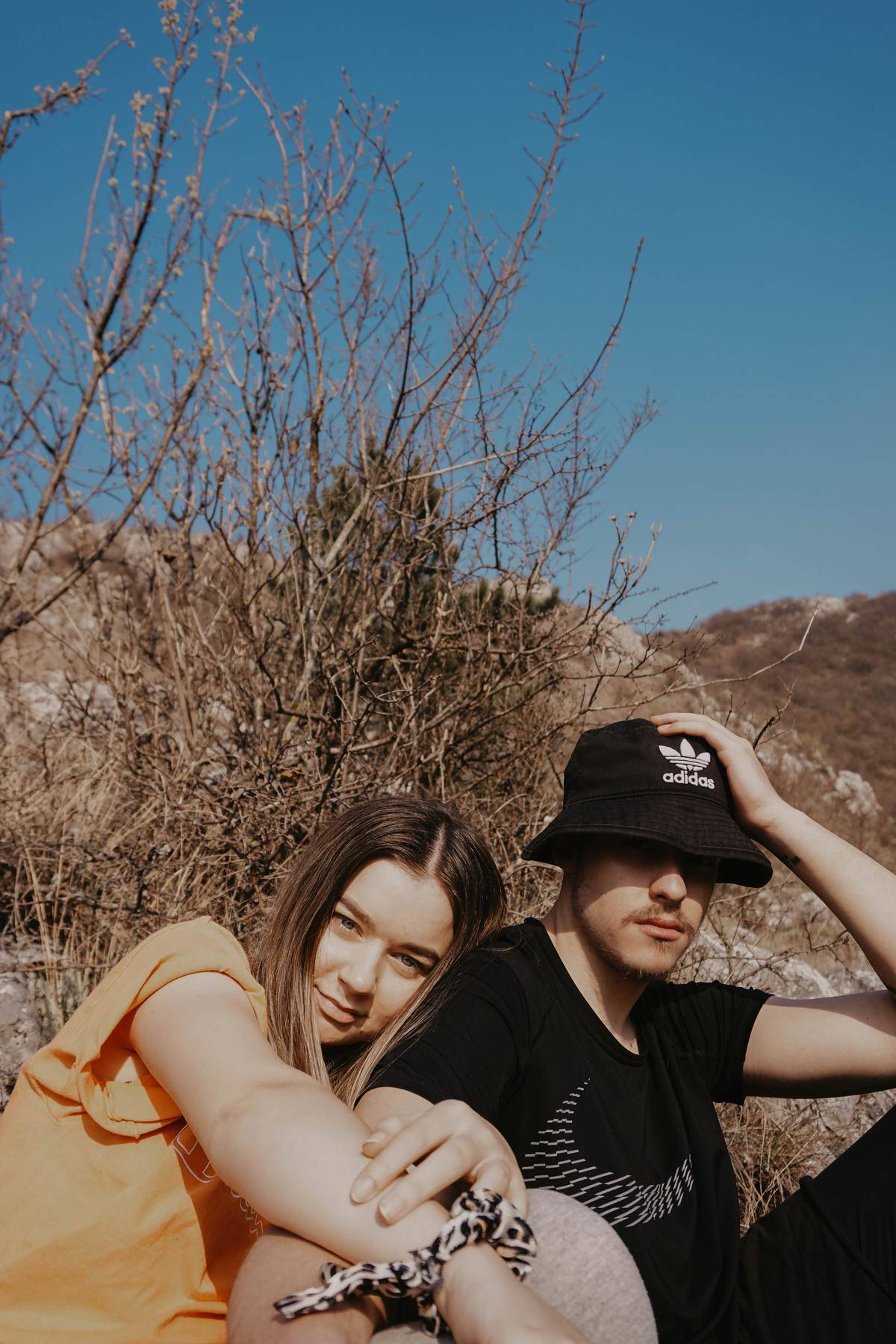 couple hanging out in the desert