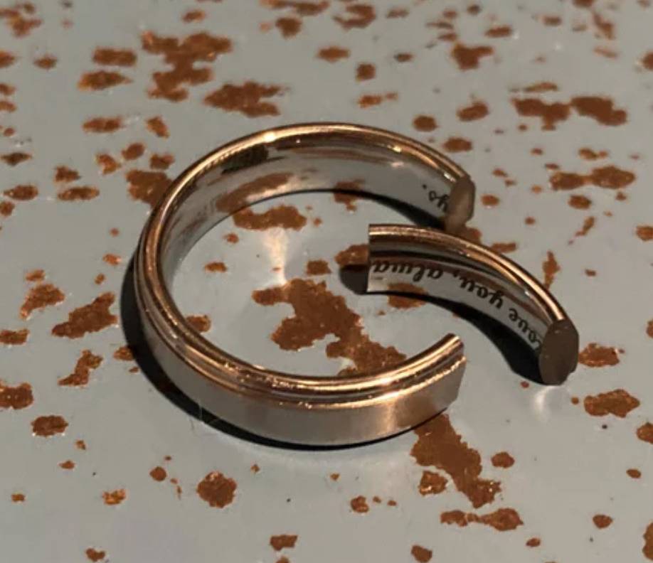 ring with segment broken off