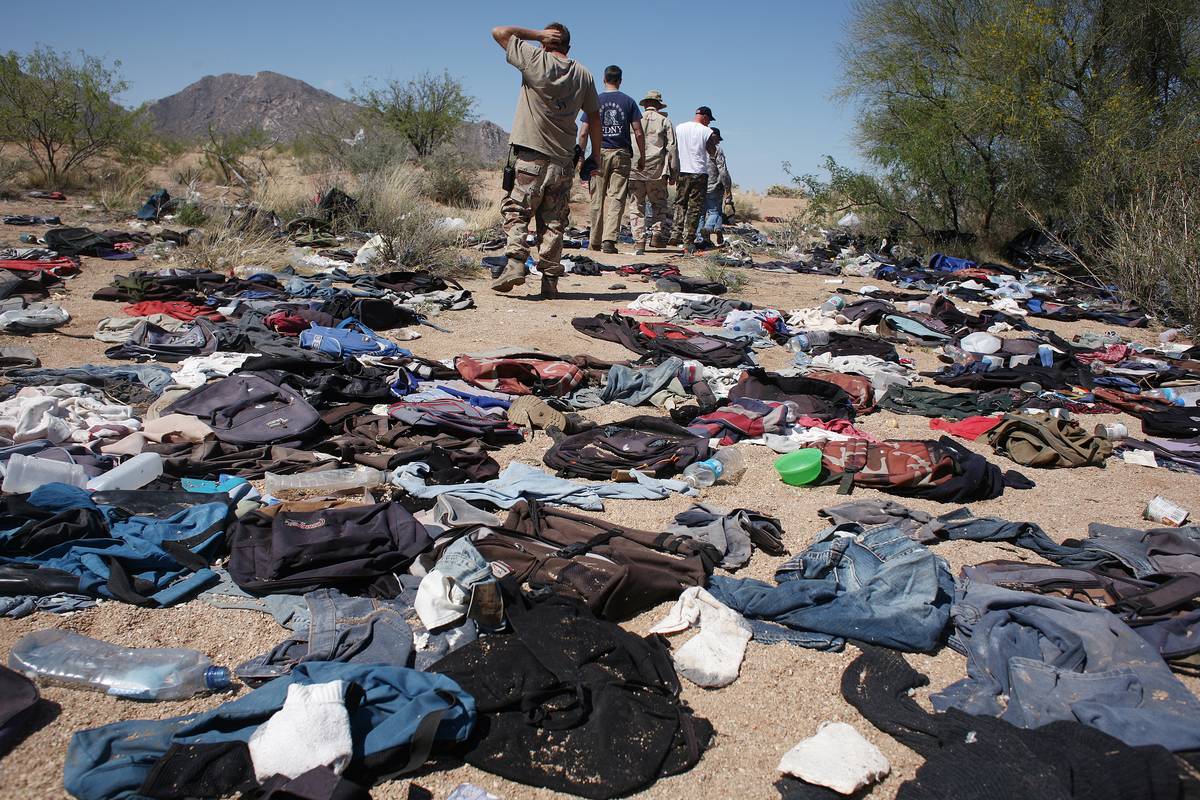Clothes lie on the ground in the Sonoran desert.