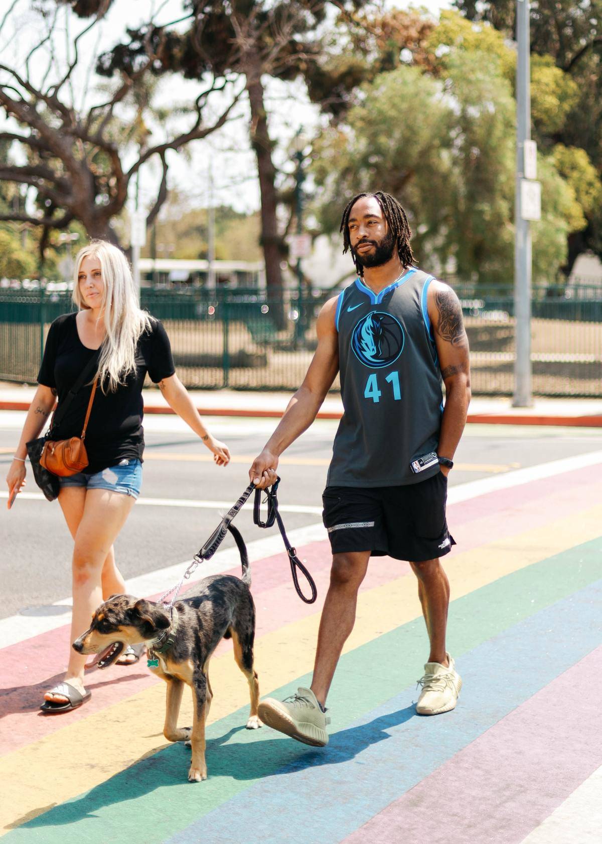 couple walking their dog