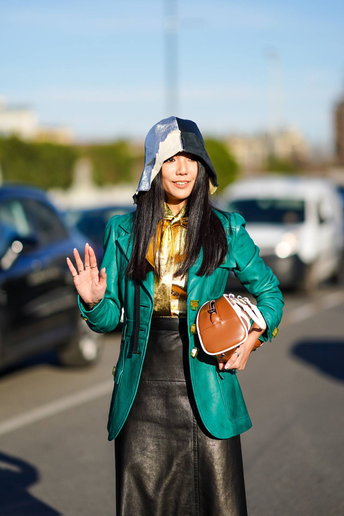 woman waving goodbye