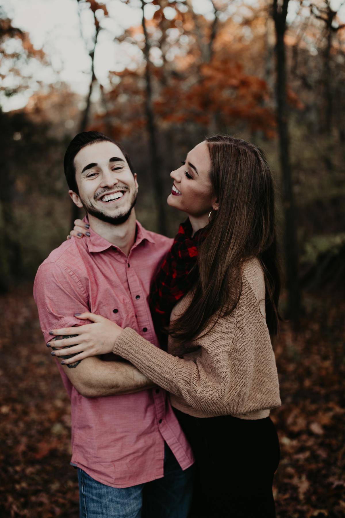 woman looks at her smiling man