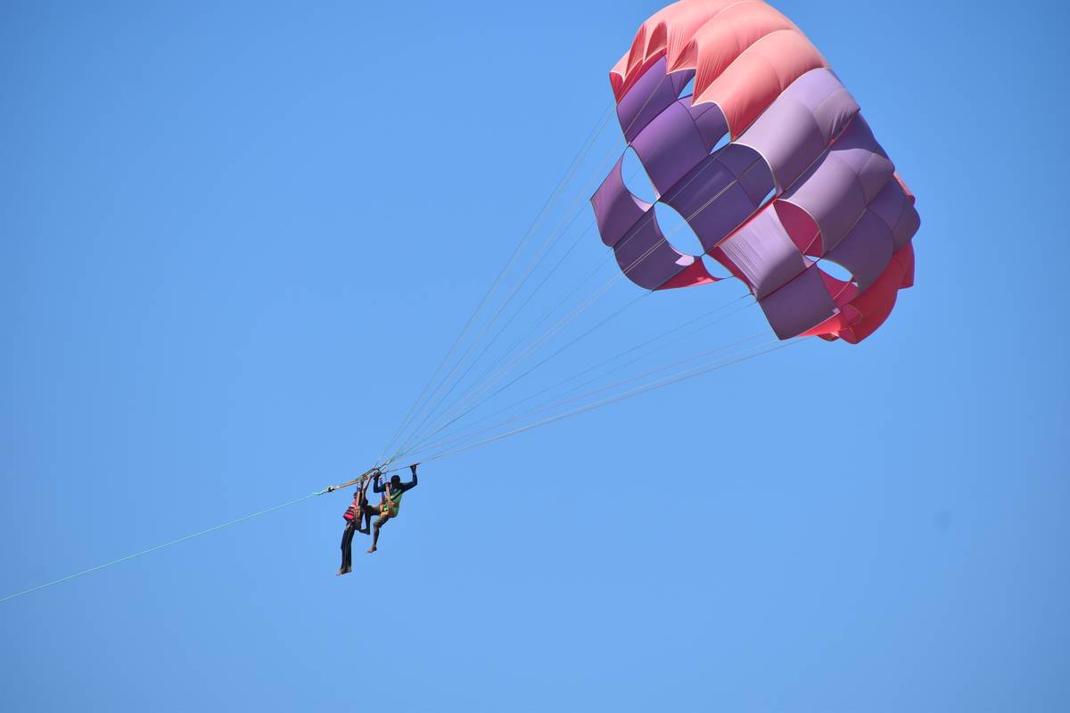 two people skydiving parachute