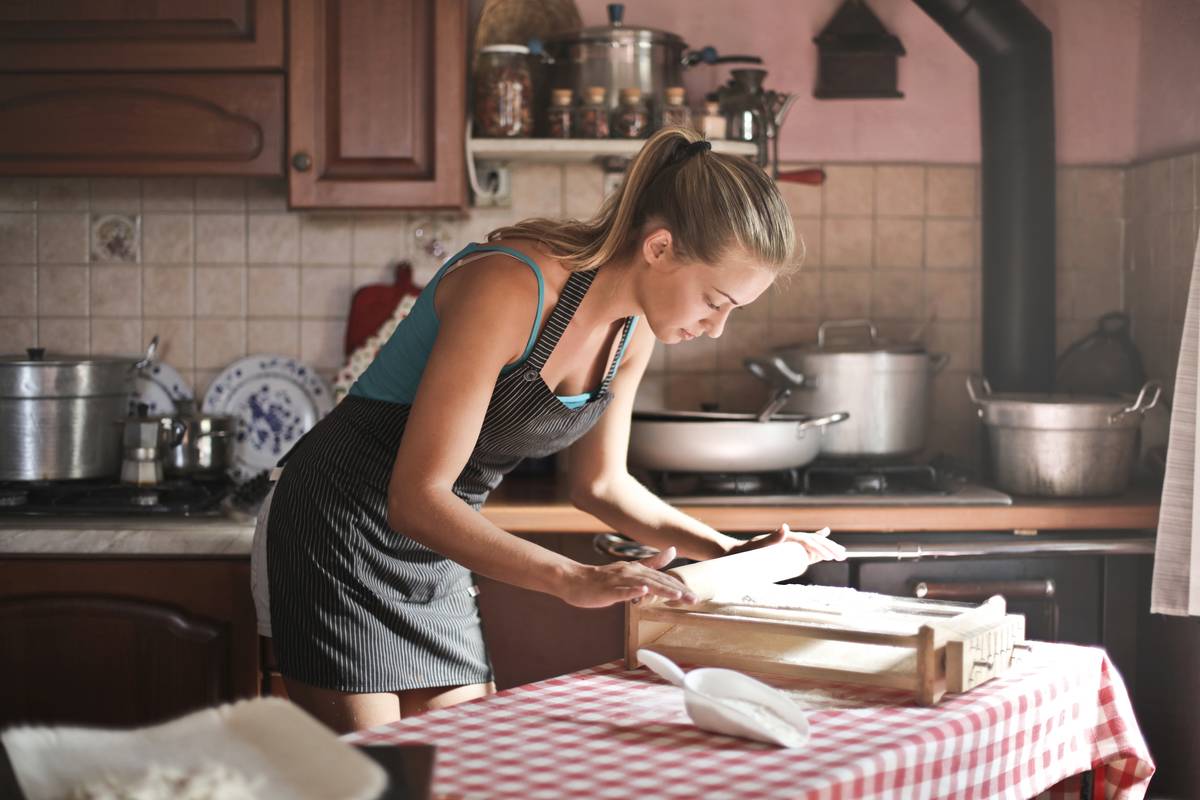 woman with apron baking