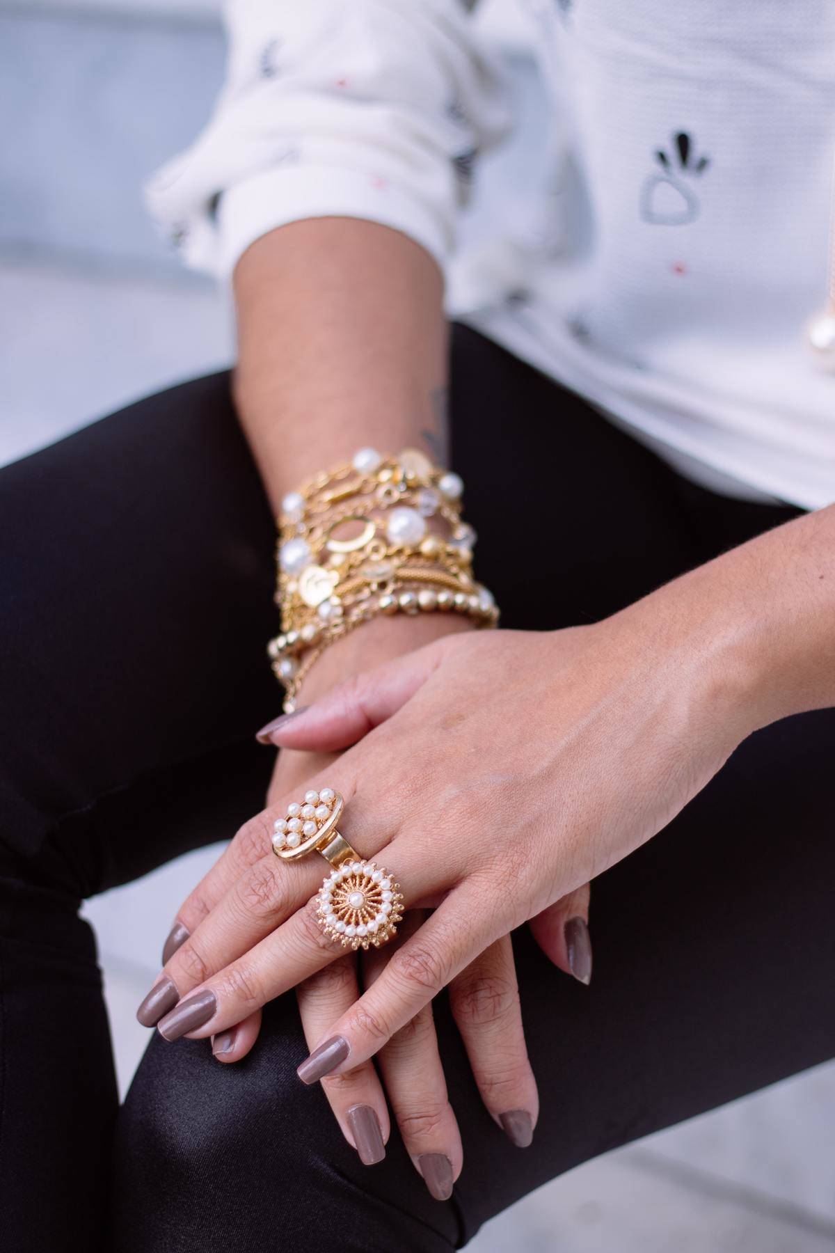 woman wearing fancy jwellery on her hand