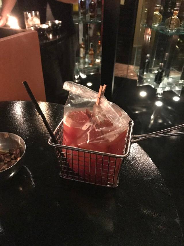 bloody mary served in plastic bag in a basket