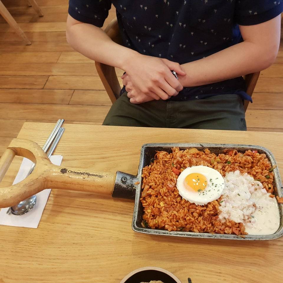 fried rice served on shovel