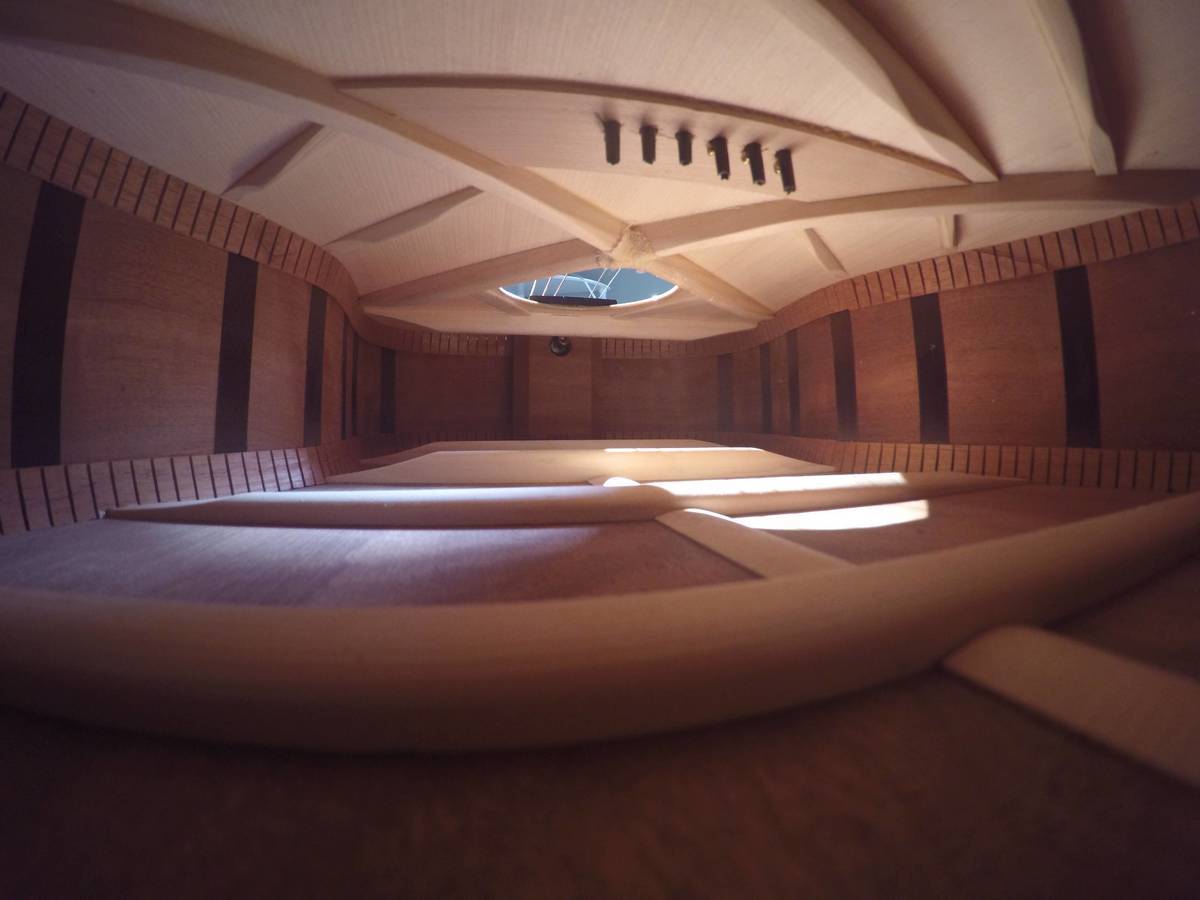 inside of wooden guitar 