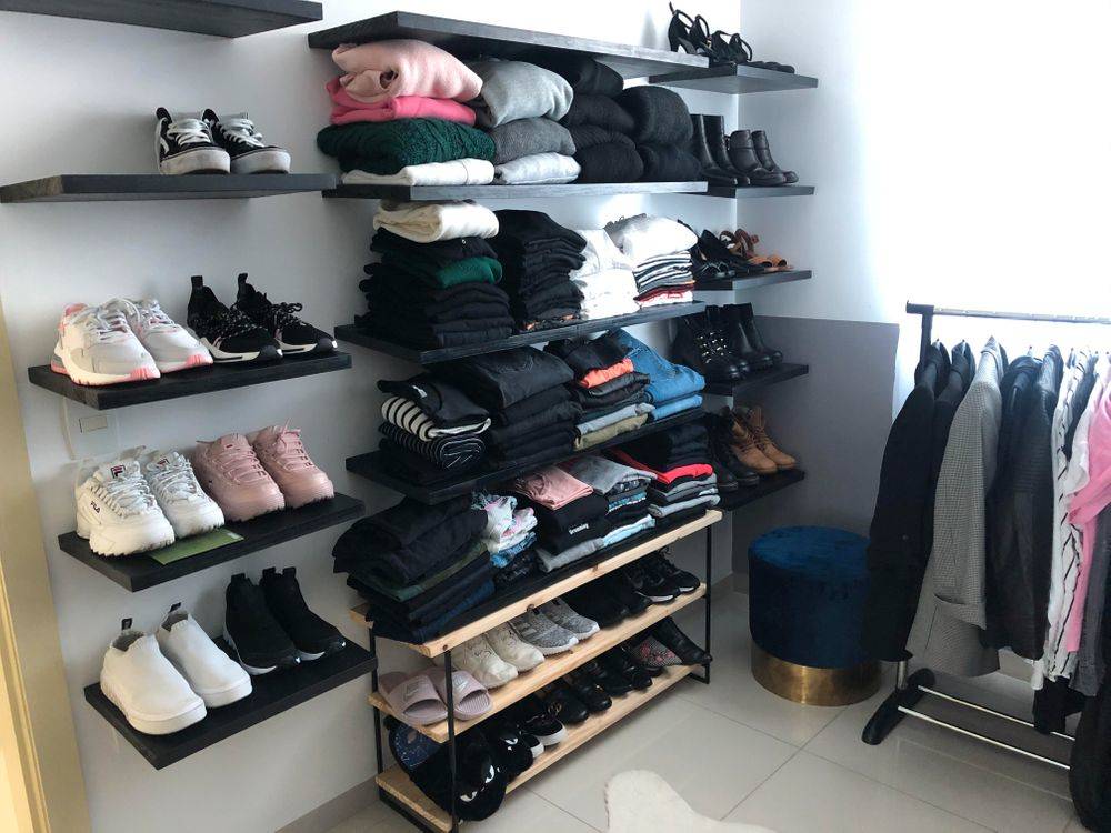 closet full of clothes organized 