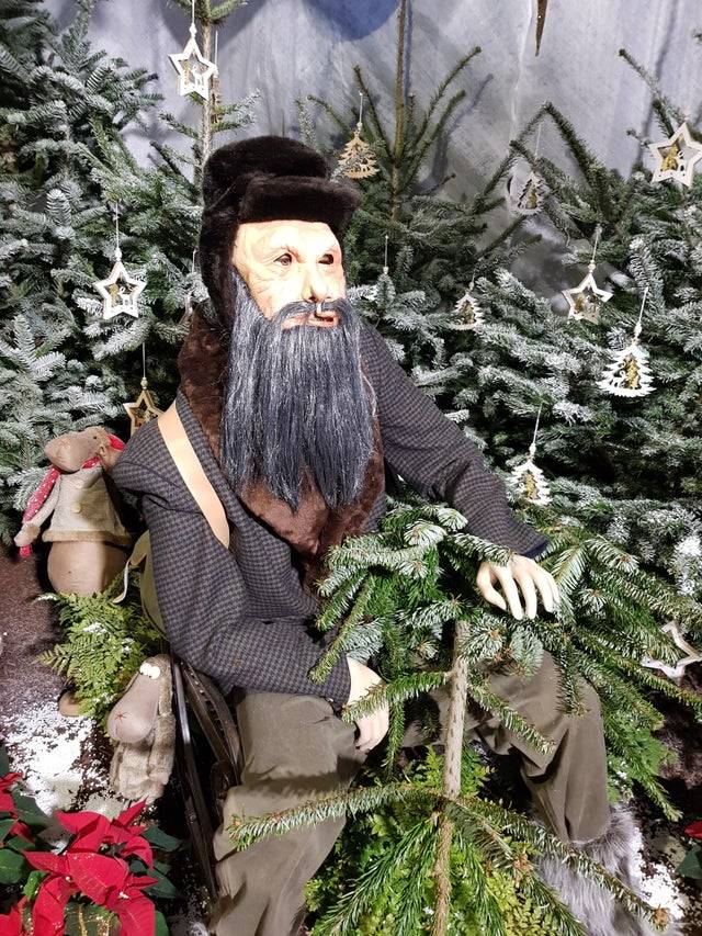 frightening old man figurine 