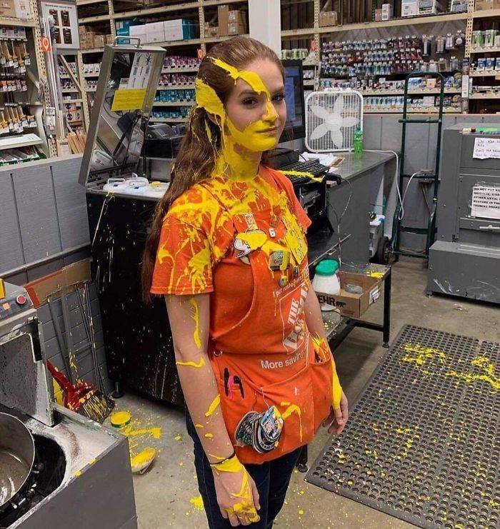 Home Depot worker covered in yellow paint