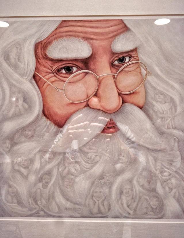 santa mural with filigrees of children in his hair