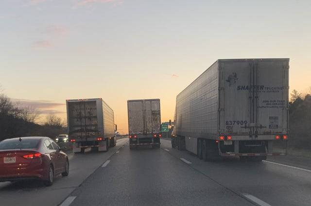 trucks blocking all highway lanes