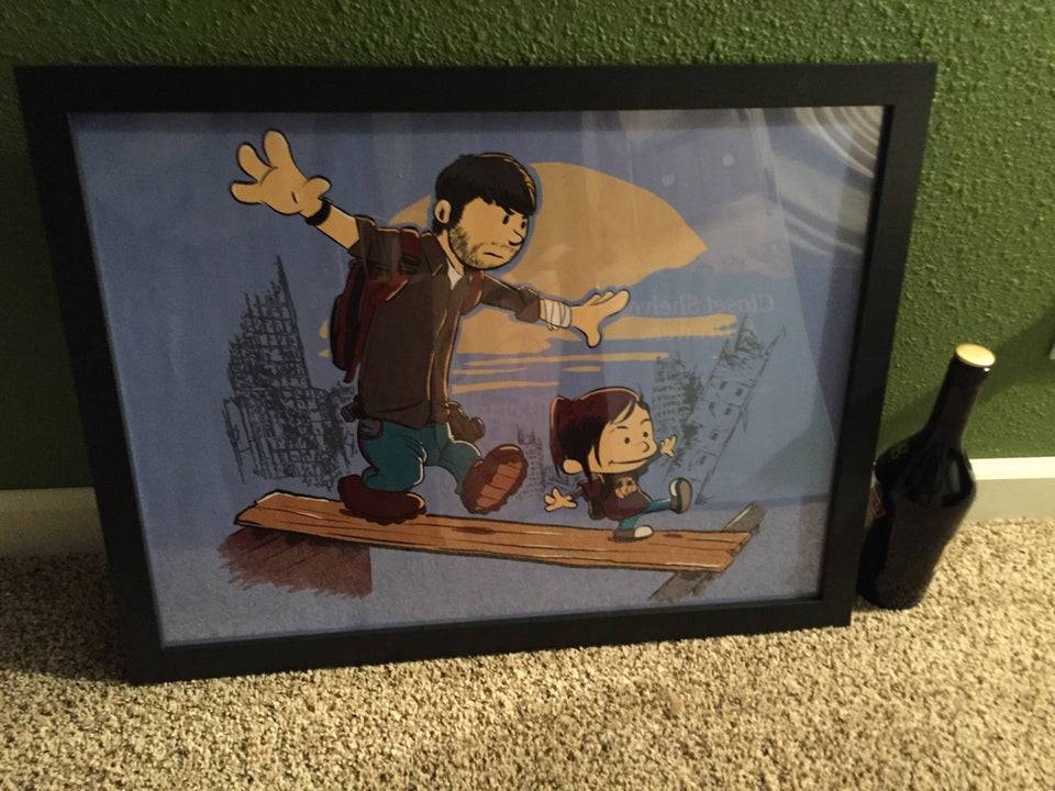 framed picture of cartoon of man and little girl walking on a board