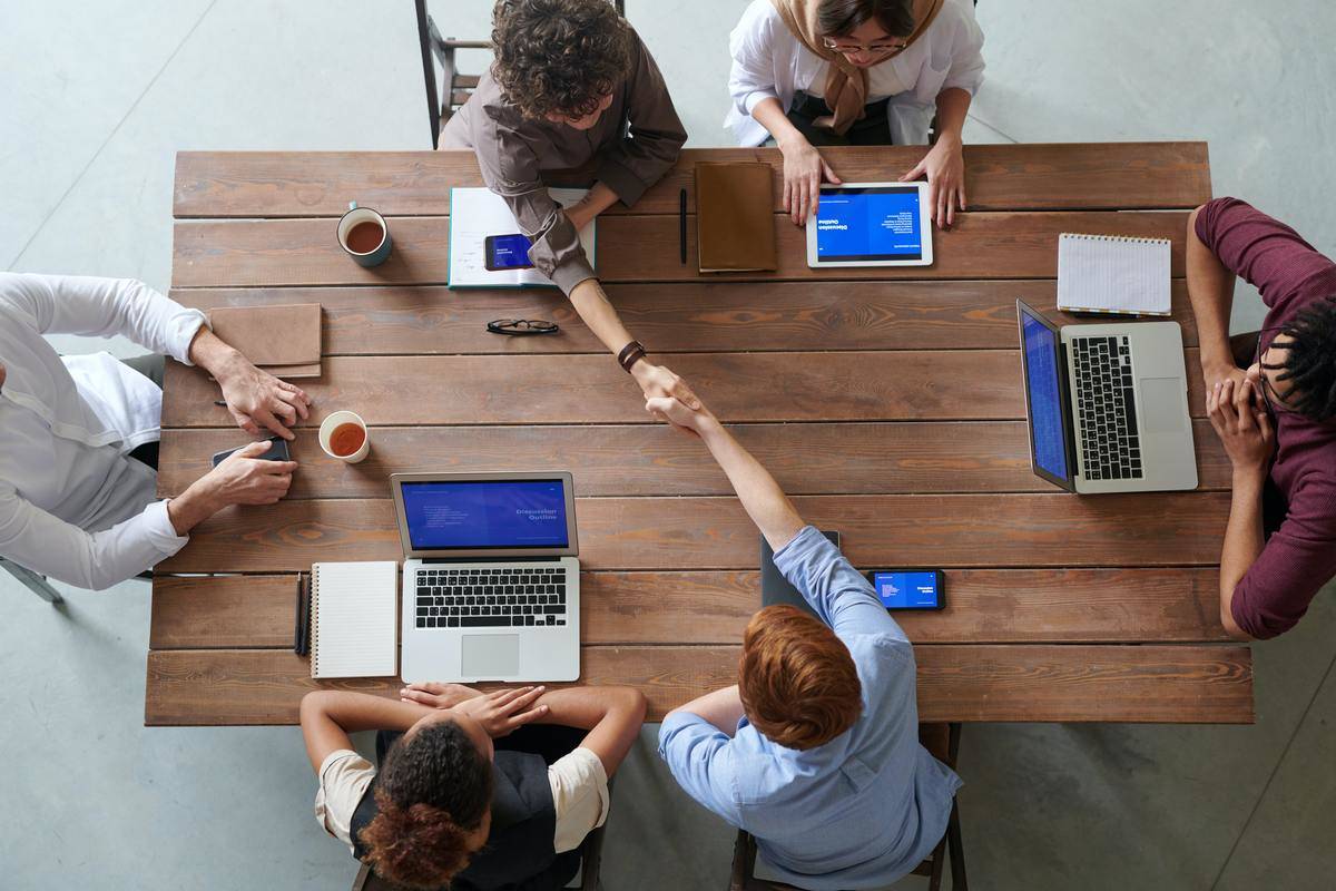 group collaborating at work meeting