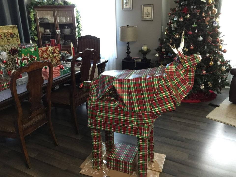 man who built a moose out of 12 wrapped gifts for wife