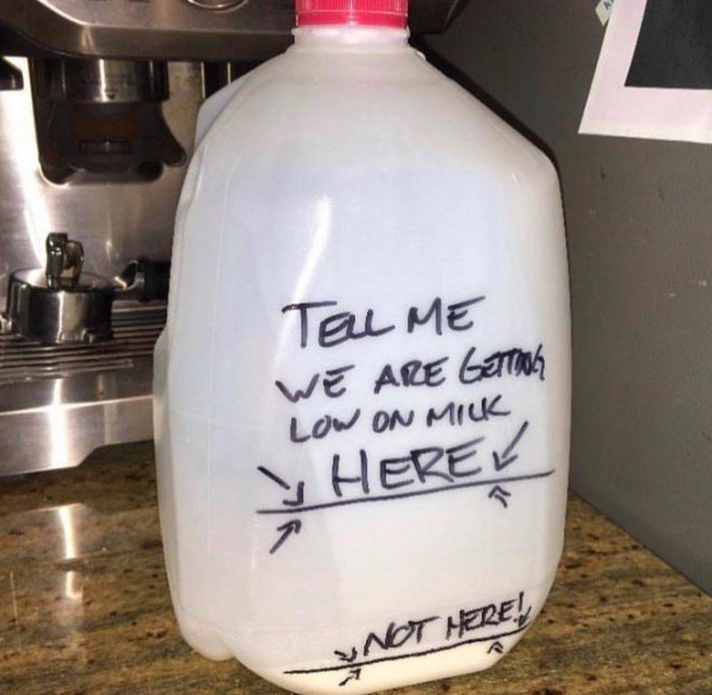 milk jug with writing on it