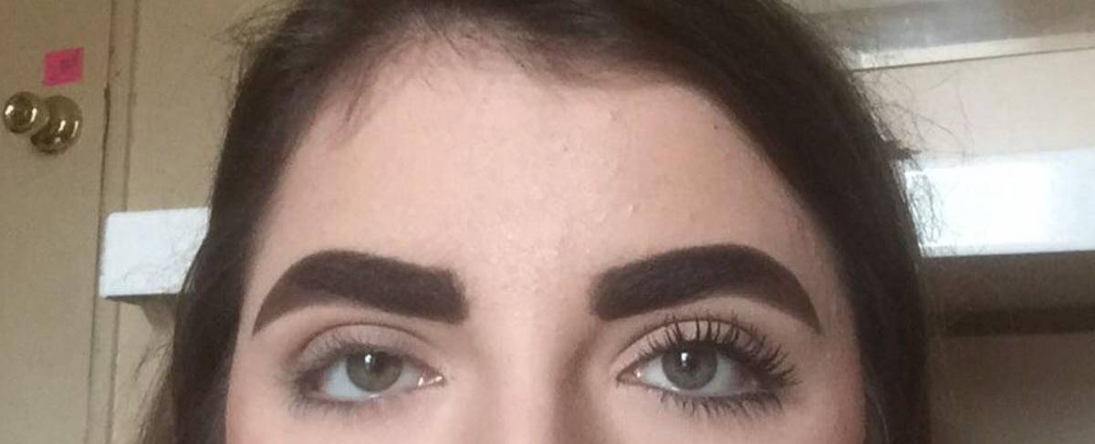 eyebrows drawn on overwhelmingly thickly