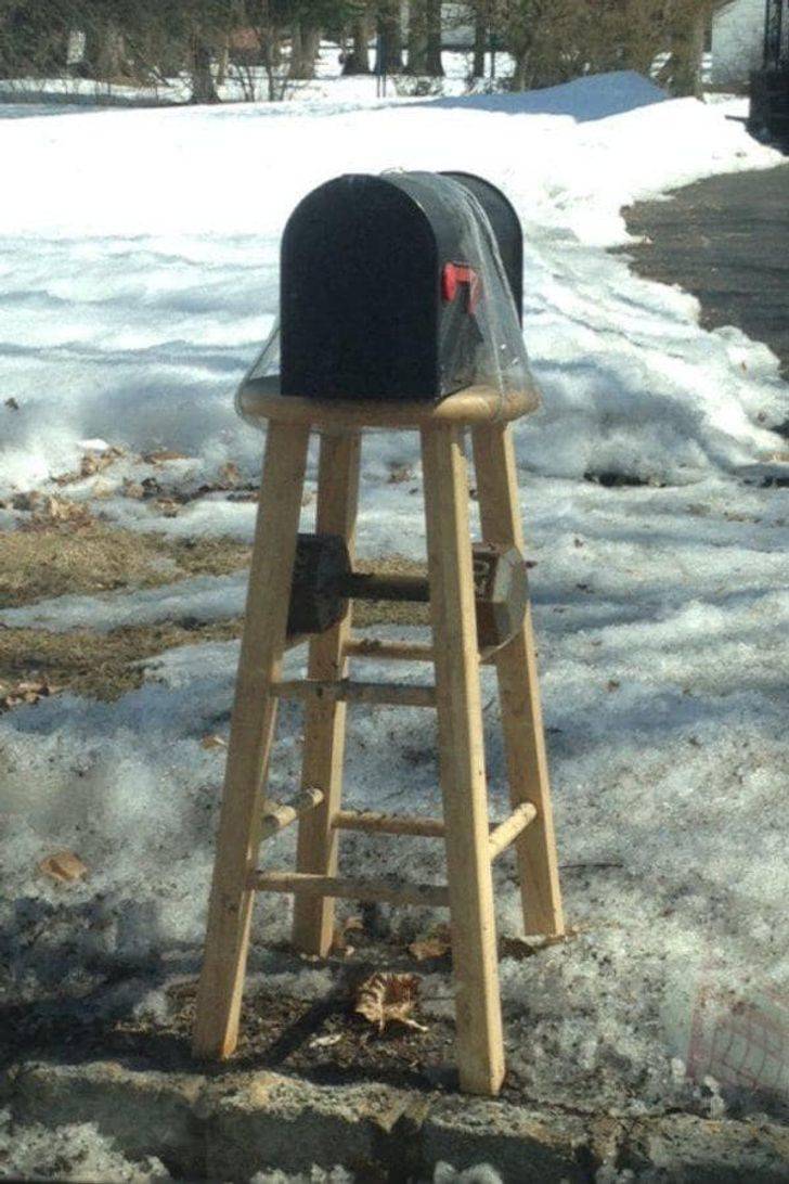 mailbox taped to stool
