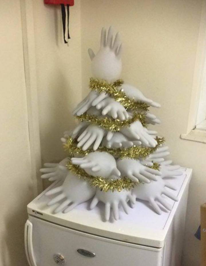 christmas tree made of blown up medical gloves with garland
