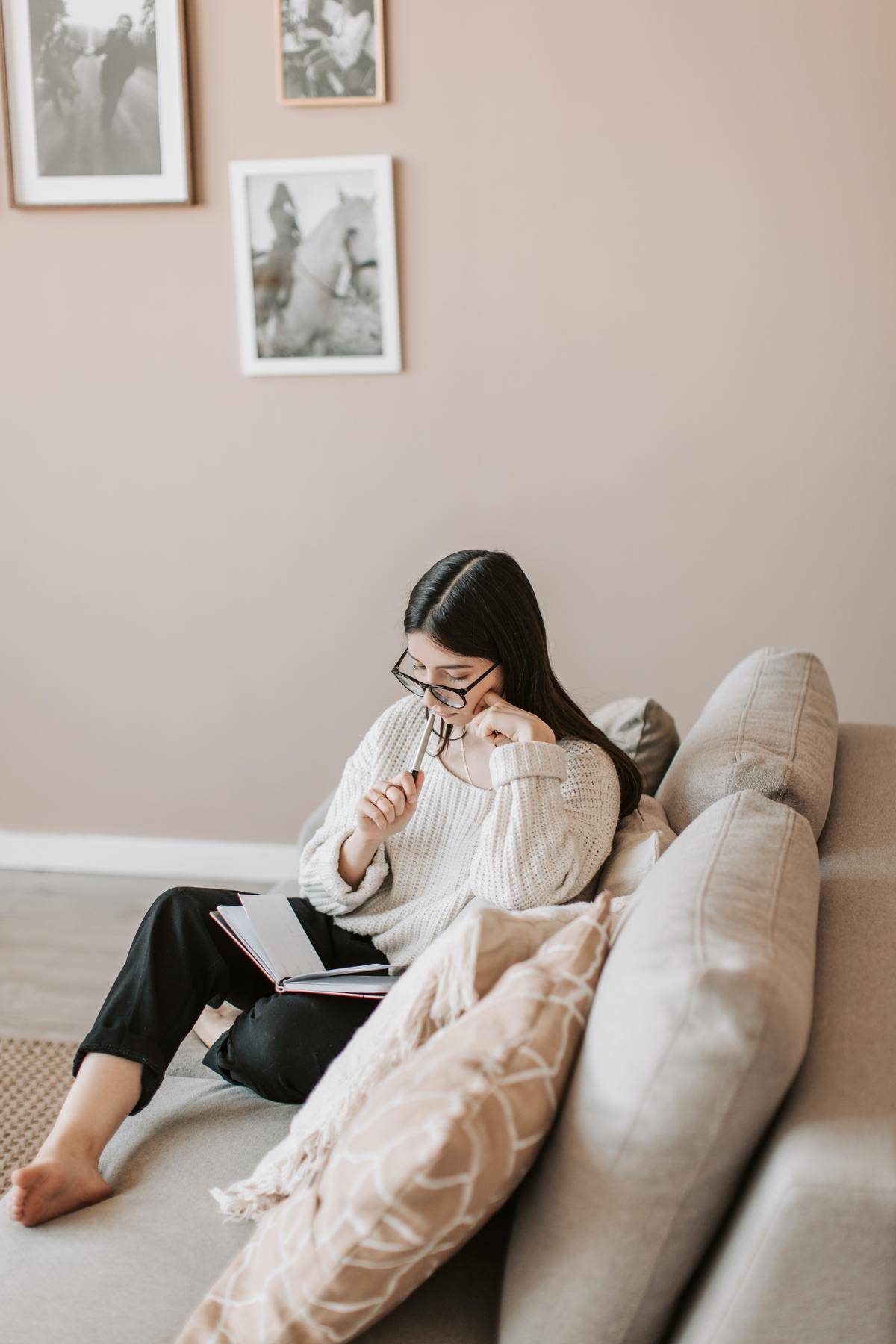 woman writing in a journal