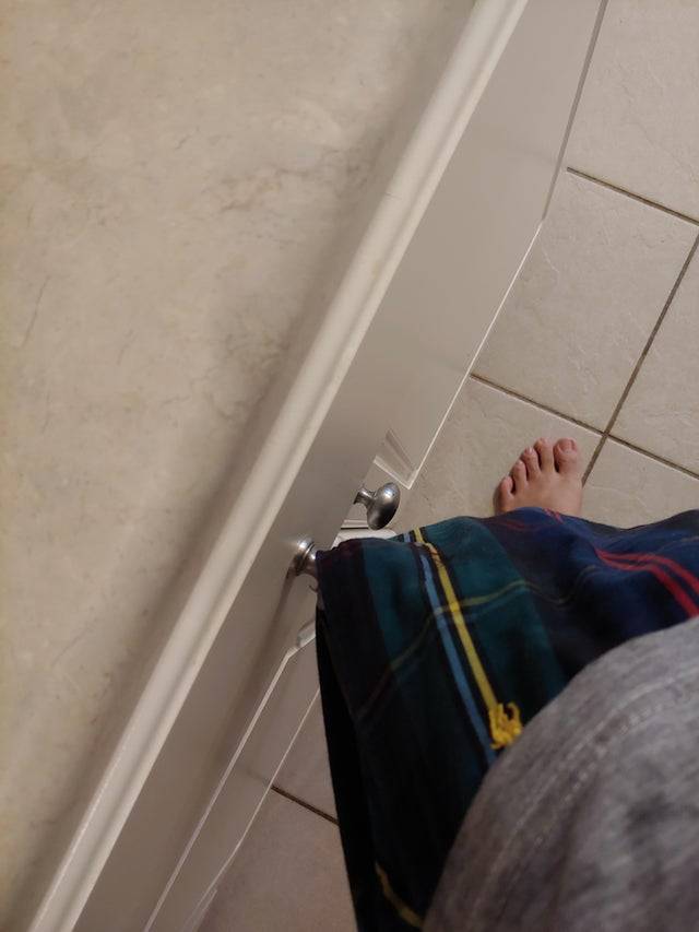 pants pocket caught on cabinet knob