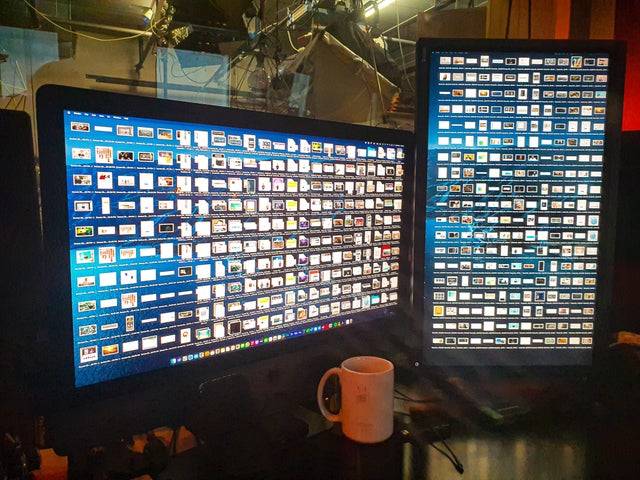 cluttered computer desktop full of icons
