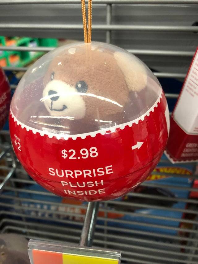 plush bear surprise ball but the container is clear plastic