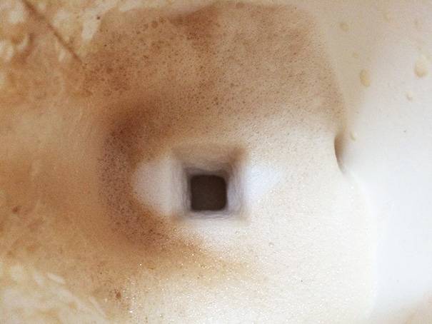 sugar cube falling through froth