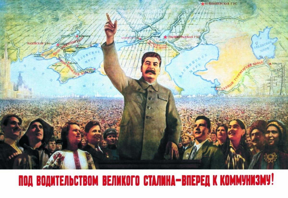 In 1900, a poster of Joseph Stalin shows him standing above Russian citizens and pointing upward.